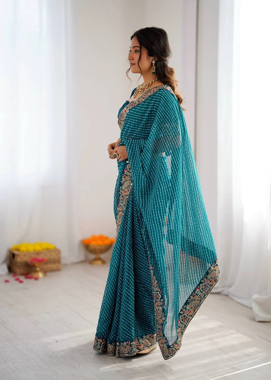 Teal blue leheriya print saree – side view on model